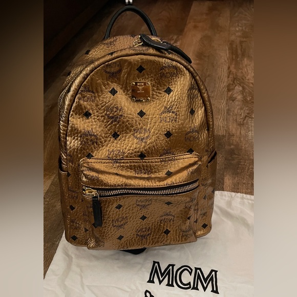 MCM gold small backpack